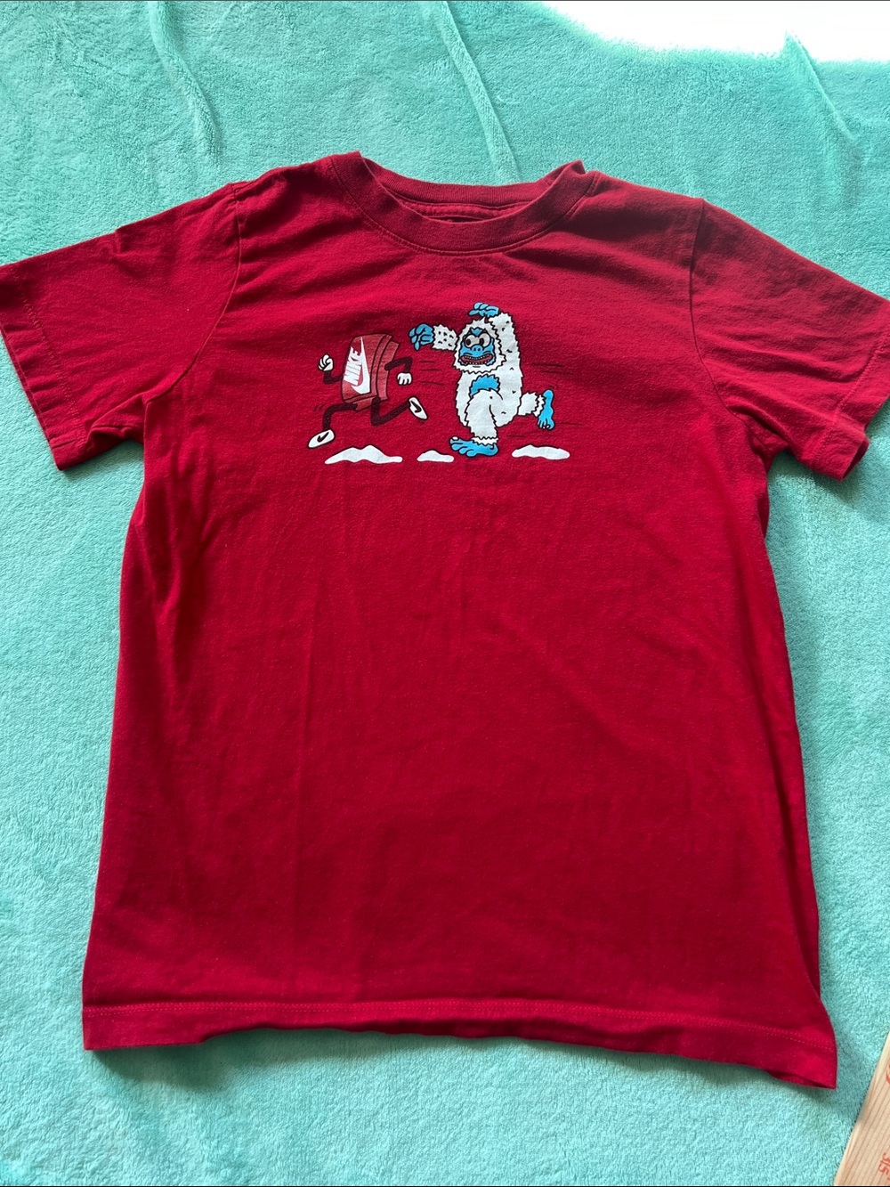 Nike Red Kids Tee with Blue-and-White Yeti Graphic